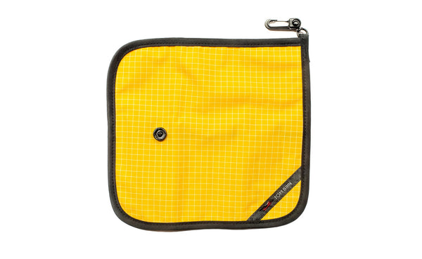 The back of a Tool Pen Wrap in Solaris (yellow with white grid) 200 Halcyon.